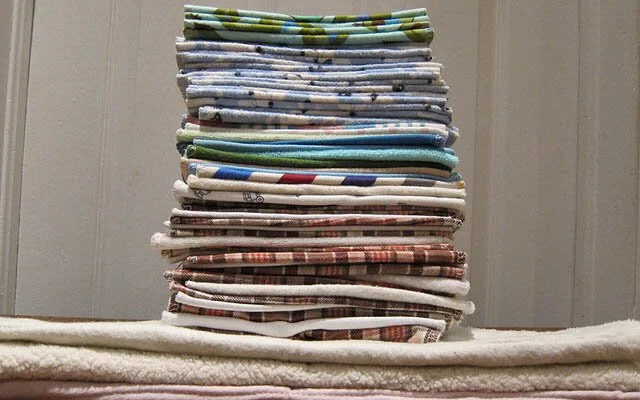 a stack of cloth to be used as cloth toilet paper
